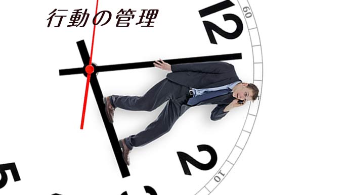 時計の針の上に乗って電話するビジネスマン
