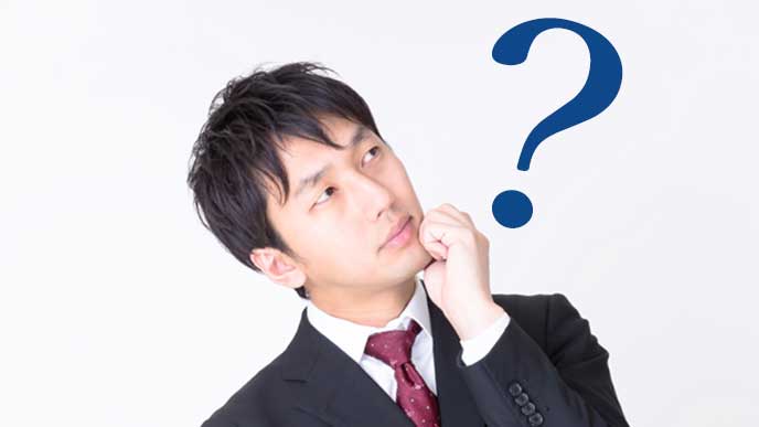 ？マークと考える男