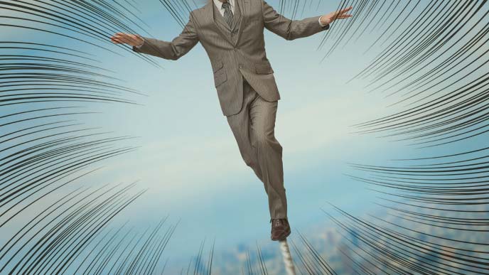綱渡りのビジネスマン