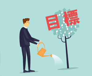 目標の木に水やりをする男性