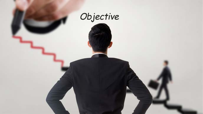 自分の目標を見つめる青年の後ろ姿